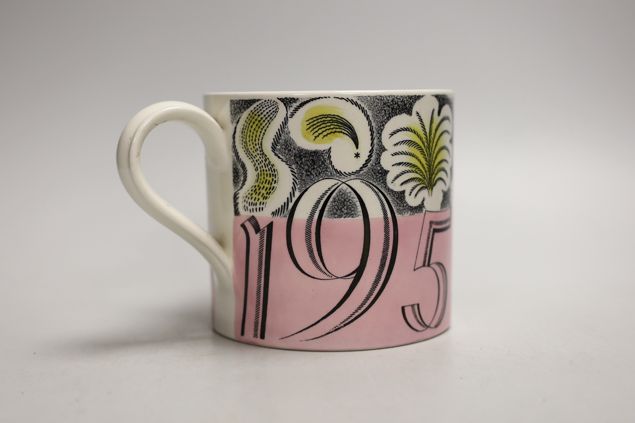 A Queen Elizabeth II coronation commemorative 1953 mug designed by Eric Ravilious